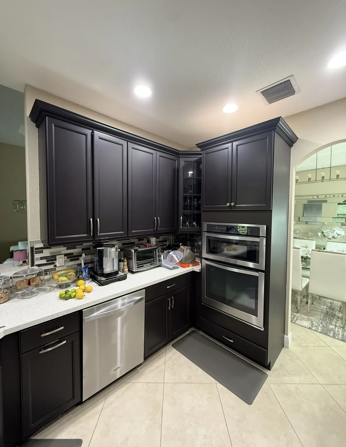 Dark cabinets with double wall ovens