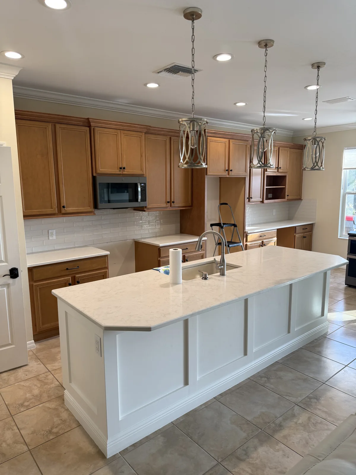 Kitchen island refinished in white