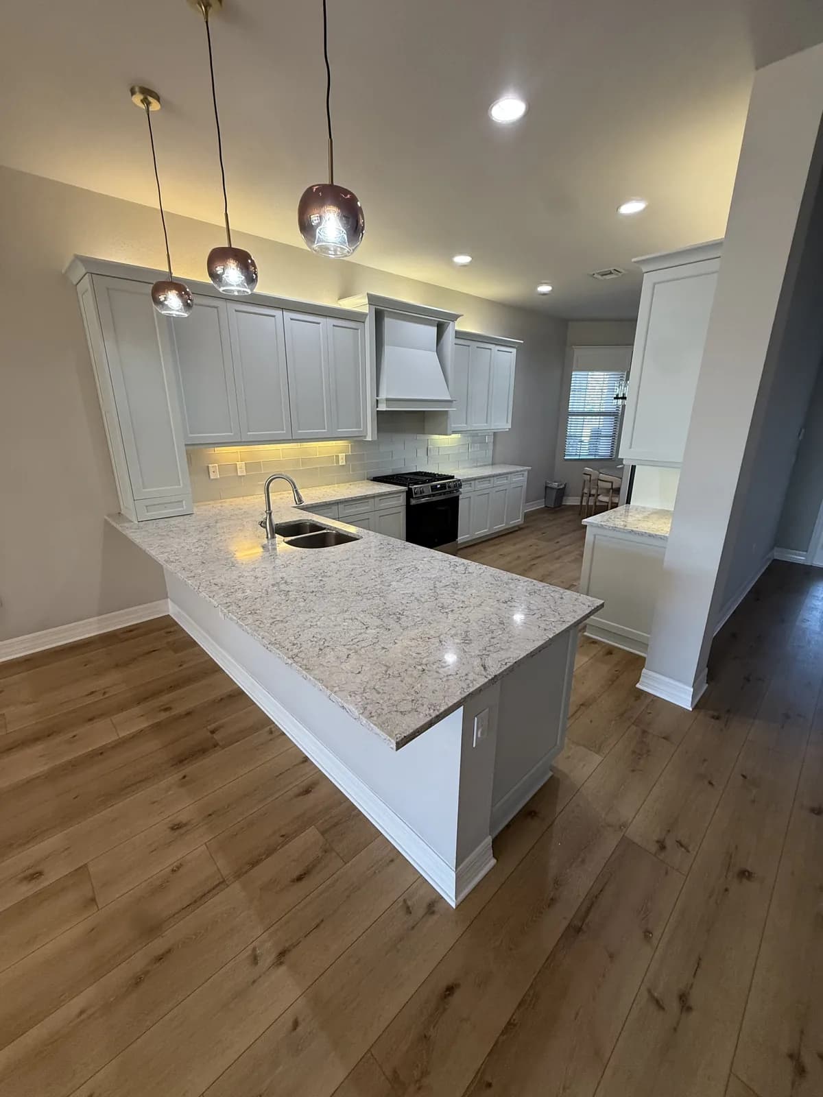Bright white kitchen after refinishing