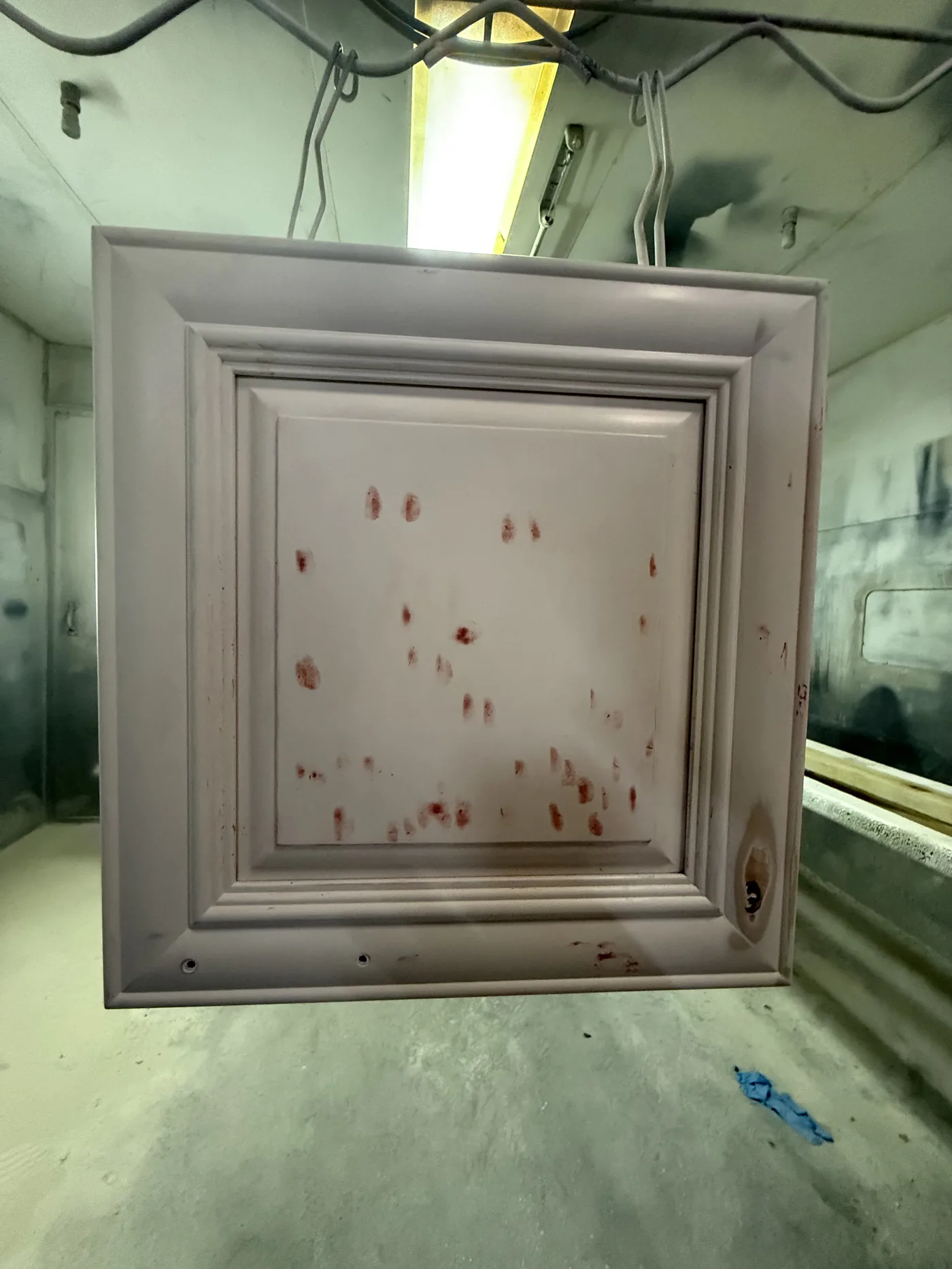 Cabinet door in the spray booth